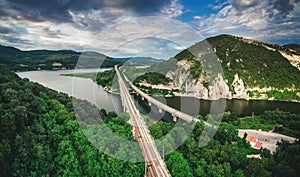 Aerial view of a bridge crossing the turquoise water of Tsonevo