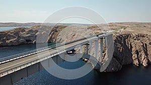 Aerial view of the bridge of the island of Pag, Croatia, road. Cliff overlooking the sea.