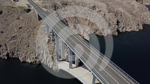 Aerial view of the bridge of the island of Pag, Croatia, road. Cliff overlooking the sea.