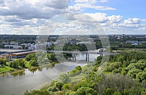 Aerial view of the bridge over the Kotorosl River, park and buildings of different centuries in Yaroslavl, Russia