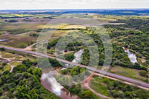 Aerial view of a bridge over the Tebicuary River in Paraguay between Natalicio Talavera and Mauricio Jose Troche.