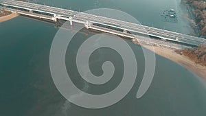 Aerial view of bridge and sea with visible oil leak