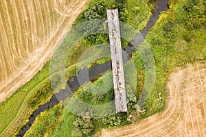 Aerial view of bridge to nowhere. An old bridge in Grenci, Latvia never getting ready