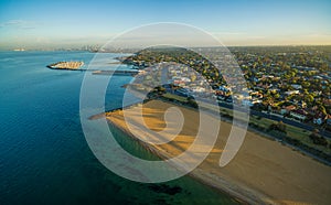 Aerial view of Brighton beach and suburb at sunrise. Melbourne,