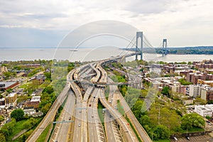 Aerial view of the Brooklyn district and the Verrazzano Narrows bridge in New York on a cloudy day