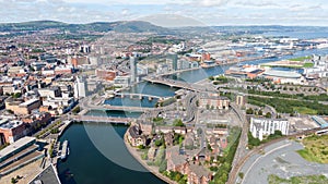 Aerial view on buildings and Lagan River in City center of Belfast Northern Ireland. Drone photo, high angle view of town