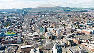 Aerial view on buildings and Lagan River in City center of Belfast Northern Ireland. Drone photo, high angle view of town