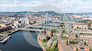 Aerial view on buildings and Lagan River in City center of Belfast Northern Ireland. Drone photo, high angle view of town