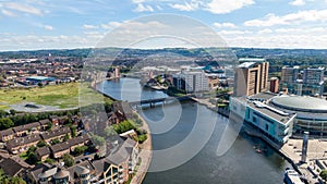 Aerial view on buildings and Lagan River in City center of Belfast Northern Ireland. Drone photo, high angle view of town