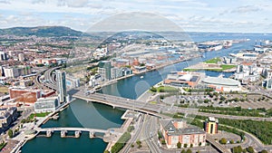 Aerial view on buildings and Lagan River in City center of Belfast Northern Ireland. Drone photo, high angle view of town