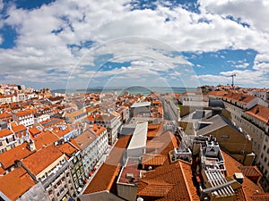 Aerial view on Buildings and street in Lisbona, Portugal. Orange roofs in city center