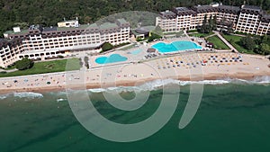 aerial view of Bulgaria's Golden Sands resort during the summer season: an array of hotels, pools, and crowds of