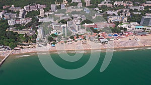 aerial view of Bulgaria's Golden Sands resort during the summer season: an array of hotels, pools, and crowds of