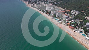 aerial view of Bulgaria's Golden Sands resort during the summer season: an array of hotels, pools, and crowds of