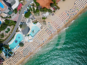 aerial view of Bulgaria's Golden Sands resort during the summer season: an array of hotels, pools, and crowds of