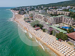 aerial view of Bulgaria's Golden Sands resort during the summer season: an array of hotels, pools, and crowds of