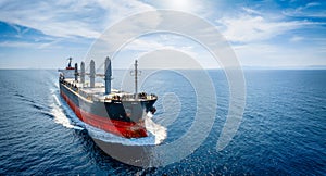 Aerial view of a bulk carrier cargo vessel at the ocean