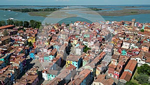 Aerial view of Burano colorful houses, along the Fondamenta embankment, Italy