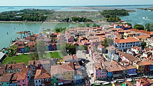 Aerial view of Burano colorful houses, along the Fondamenta embankment, Italy