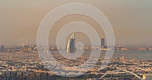 Aerial view of Burj Al Arab Jumeirah Island or boat building, Dubai Downtown skyline, United Arab Emirates or UAE. Financial