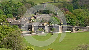 Aerial view of Burnsall, and its well known bridge in Wharfedale, Yorkshire Dales National Park, North Yorkshire, England, Britain