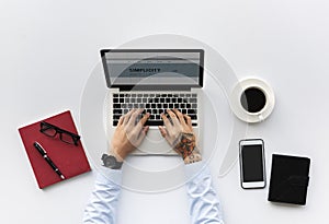 Aerial view of businessman using computer laptop workspace