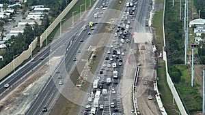 Aerial view of busy american freeway road under construction with heavy traffic in Sarasota, Florida. Development of