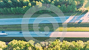 Aerial view of busy american highway with fast moving traffic. Interstate transportation concept