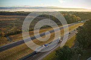 Aerial view of busy american highway with fast moving traffic. Interstate transportation concept