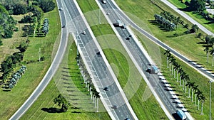 Aerial view of busy american highway with heavy fast moving traffic in Florida. Interstate transportation concept