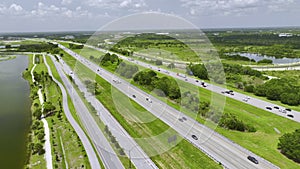 Aerial view of busy american highway with heavy fast moving traffic. Interstate transportation concept