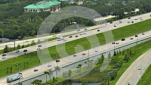 Aerial view of busy american highway with heavy fast moving traffic. Interstate transportation concept