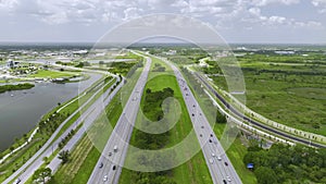 Aerial view of busy american highway with heavy fast moving traffic. Interstate transportation concept