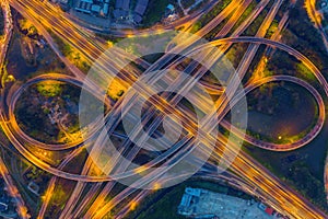 Aerial view of busy highway road junctions at night photo