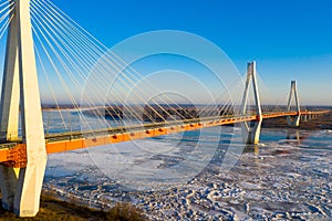 Aerial view of cable-stayed Murom Bridge across Oka river