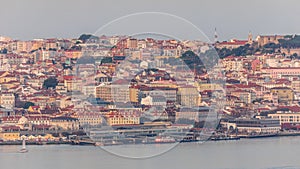 Aerial view of the Cais Do Sodre ferry terminal by the Tage river timelapse in Lisbon, Portugal photo