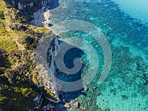 Aerial view of the Calabrian coast, cliffs overlooking the crystal clear sea. Riaci, Tropea, Italy