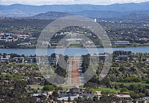 The Aerial view of Canberra from the top of mountain, the image shows the Parliament House and Australian War Memorial.