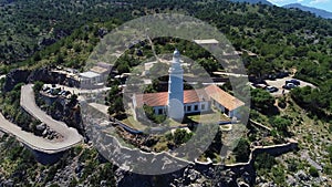 Aerial view of Cap Gros lighthouse located on a cliff in the vicinity of Port Soller, Mallorca