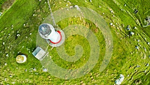 Aerial view on Cape Egmont lighthouse with farmland on the background. Taranaki region, New Zealand