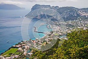 Aerial view of Capri island and grand marina bay.