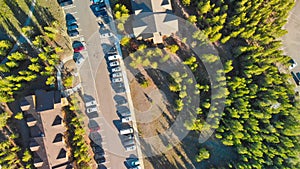 Aerial view of car parking in the middle of a forest