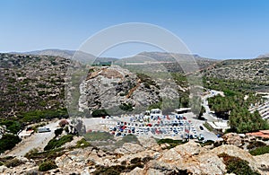 Aerial view on a car parking near Vai beach at eastern part of Crete island, Greece