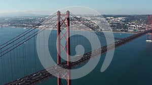 Aerial view of car traffic on 25 De April Bridge in Lisbon city, Portugal