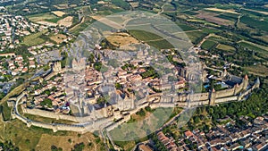 Aerial view of Carcassonne medieval city and fortress castle from above, Sourthern France