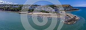An aerial view from Cardigan Bay across the harbour and town at New Quay, Wales