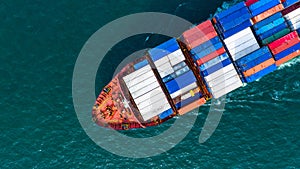 Aerial view cargo container ship carrying container for import and export, business logistic and freight transportation by ship in