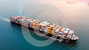 Aerial view of cargo container ship on ocean photo