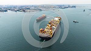 aerial view cargo container ship sailing in sea to import export goods transportation and commercial port background