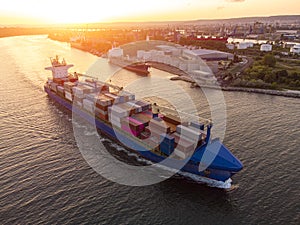 Aerial view of cargo container ship in the sea